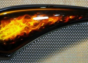 Custom flame paint job on a motorcycle fuel tank