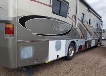 Side view of a Class A motorhome RV